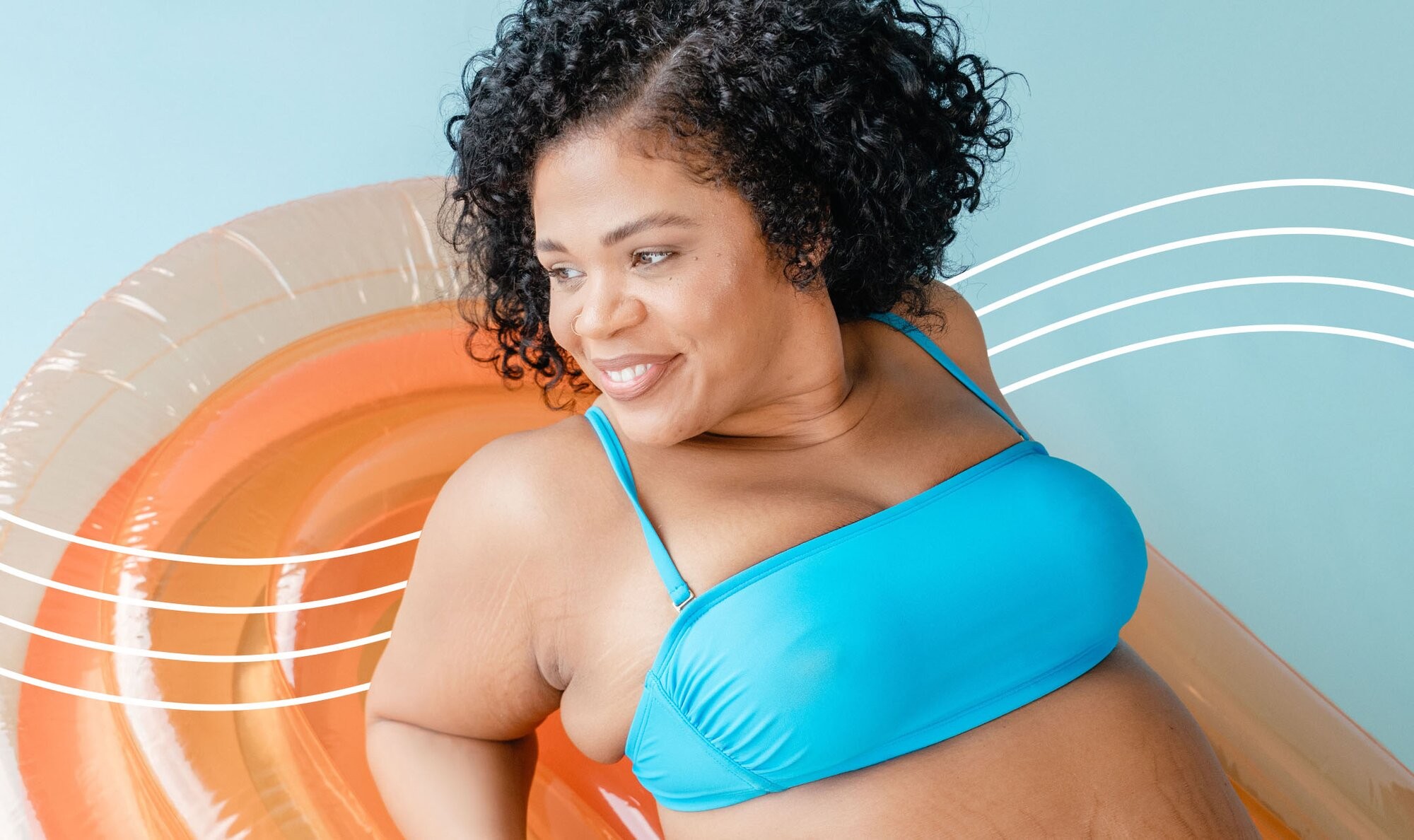 Woman in a blue bikini floating on a donut float for a piece title chin laser hair removal