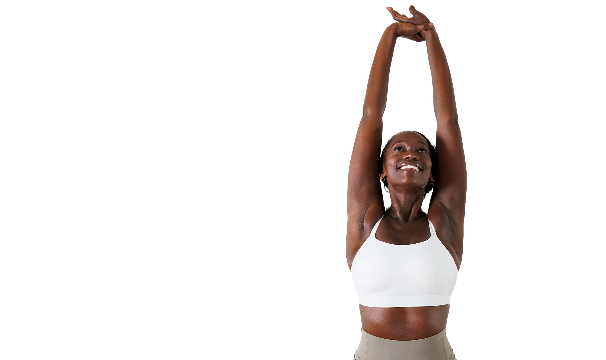 Woman showing smooth underarm after laser hair removal treatment