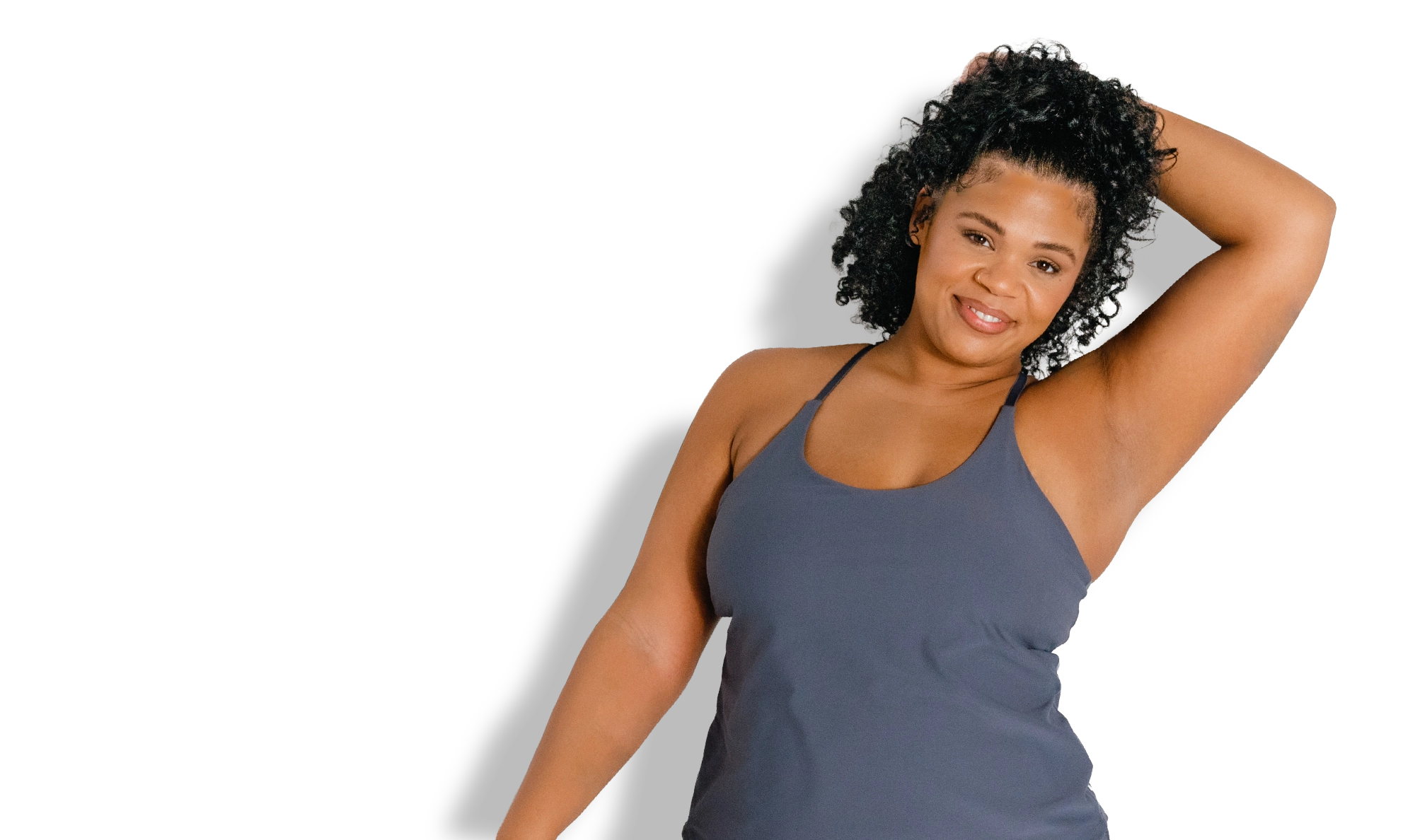 Woman showing smooth underarm after laser hair removal treatment