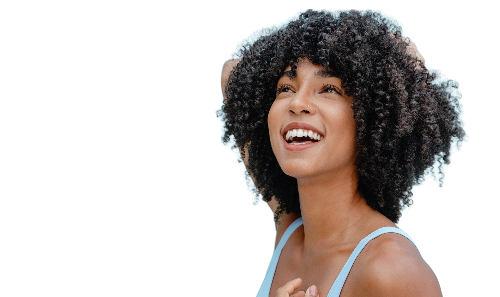 Woman showing smooth underarm after laser hair removal treatment