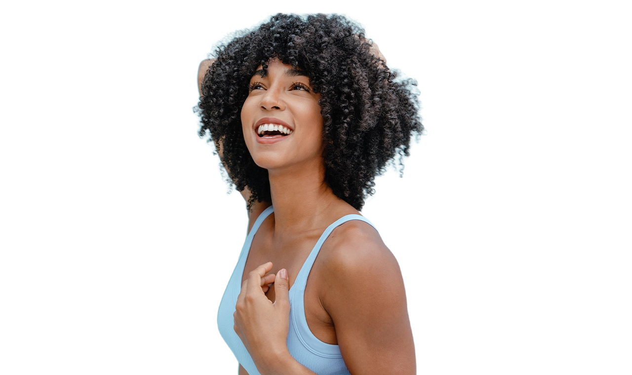 Woman showing smooth underarm after laser hair removal treatment